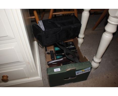 A box containing various cameras, tripod, and a Zeiss Ikon camera case