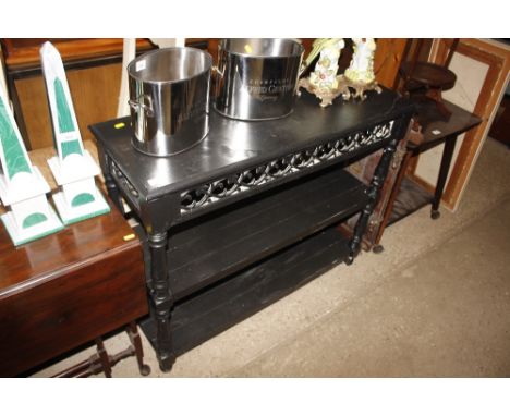 A black painted three tier shelf 