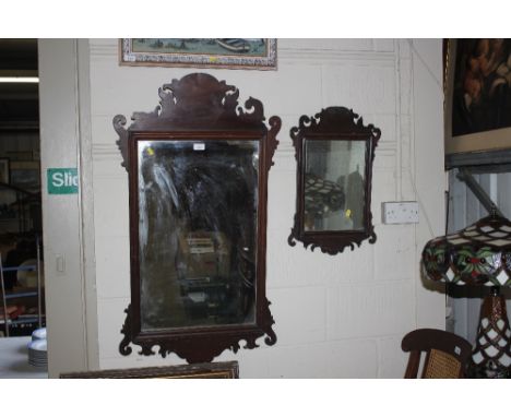 Two Chippendale style wall mirrors 