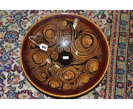 A POOLE POTTERY AEGEAN PATTERN BOWL, brown glazed abstract design, printed and painted marks, diameter 34cm (Condition:- good