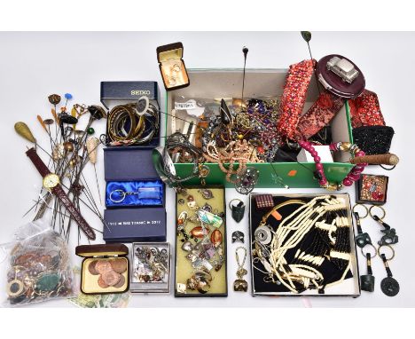 A BOX OF ASSORTED COSTUME JEWELLERY AND ITEMS, to include a white metal openwork floral brooch stamped '925', a silver thistl