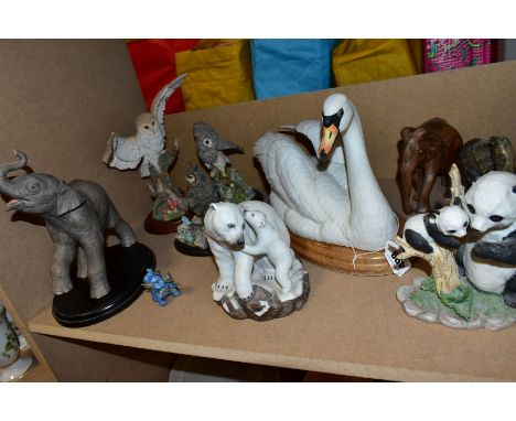 A GROUP OF ORNAMENTS, comprising Goebel 'Mute Swan' on wooden plinth (slight chip to tail), County Artists 'Gorilla-Mother/Yo