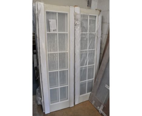 A COLLECTION OF FIFTEEN GLAZED PANEL EFFECT INTERIOR DOORS, width 61cm x height 198cm x depth 3.5cm (In original packaging)