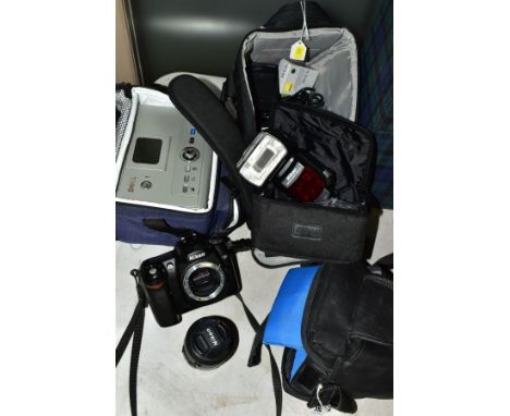 PHOTOGRAPHIC EQUIPMENT comprising Nikon D50 camera body, fitted with a Nikon 18.55 3.5-5.6 DX zoom lens (lens flange broken),