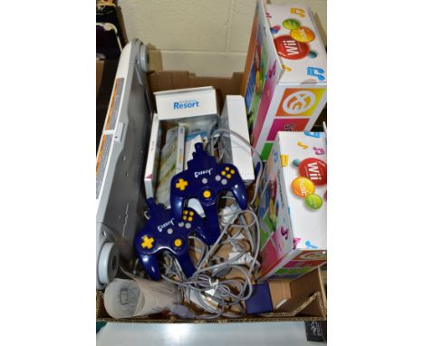 A BOX OF NINTENDO WII GAMING EQUIPMENT, including console and power cables, a nunchuck, manuals, a Wii Fit board, Wii Fit Plu