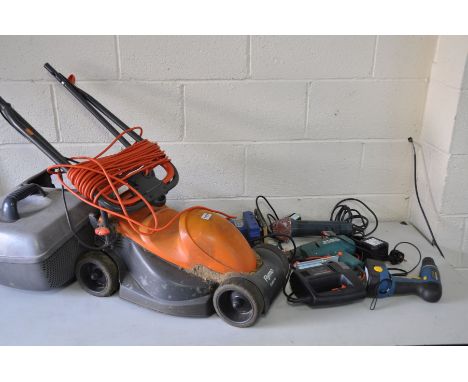 A FLYMO EASIMO ELECTRIC LAWNMOWER together with a quantity of electric tools to include a Workzone battery powered drill, a B