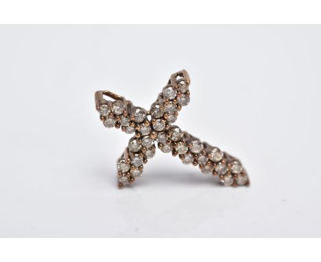 A 9CT GOLD DIAMOND PENDANT, in the form of a cross, set with brilliant cut diamonds, total estimated 0.36cts, hallmarked 9ct 