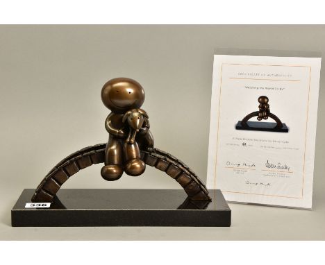 DOUG HYDE (BRITISH 1972) 'WATCHING THE WORLD', a limited edition bronze sculpture of a boy and dog on a bridge 67/250, impres