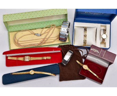 A BOX OF LADIES WRISTWATCHES, to include a cased yellow metal Rotary watch and bracelet gift set, a white metal Rotary  bangl