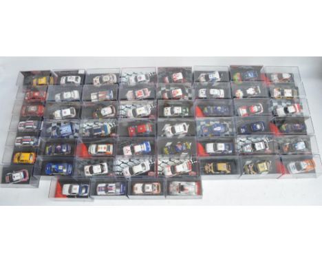 Extensive collection of diecast 1/43 scale mostly rally car models from Ixo, Vitesse, Auto Art, DeAgostini etc including many
