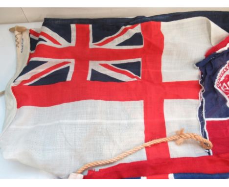 Collection of vintage flags, including the Naval Association, the Union Flag etc. 