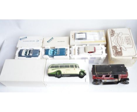 Four boxed 1/24th scale diecast vehicles to include a Franklin Mint 1953 Cadillac Eldorado (model with paperwork, some cracki