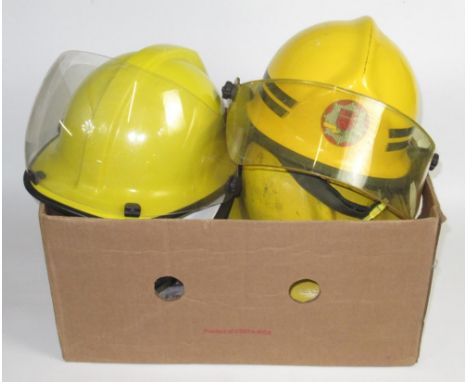 Five Irish vintage firefighter helmets of various styles and eras, including a c1994 Cairns and Bro BSI Dublin Fire Brigade h