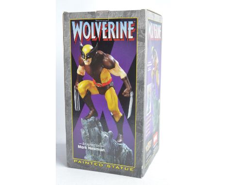 Bowen Designs Marvel 11" tall 1/8th scale cold cast porcelain Wolverine (yellow classic version) diorama based statue (as scu