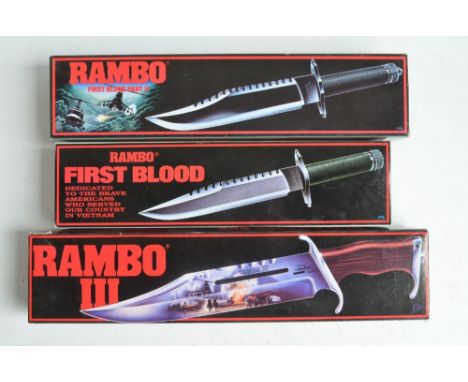 Three officially licensed full size Rambo movie replica bowie knives from First Blood, First Blood Part II and Rambo III by U