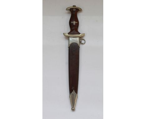 German War period 1933 Pattern SA Dagger. With Eagle symbol and Sa rune inset in handle. Blade is inscribed and also has the 
