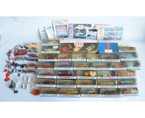 Collection of boxed diecast car models from Dinky, most attached to bases and generally in mint condition, boxes generally po