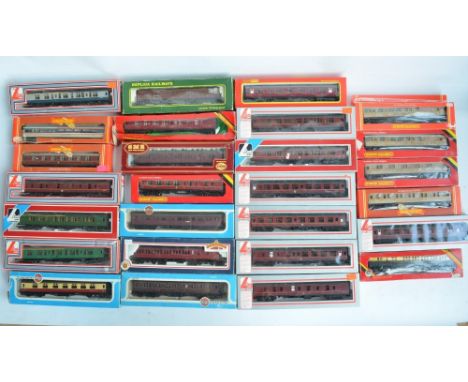 Twenty seven boxed OO gauge railway carriages from Hornby, Lima, Bachmann, Airfix and Replica Railways, condition of models g