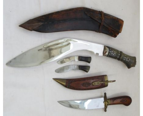 Buffalo horn-handled Kukri with original sheath and accompanying Chakmak and Karda. Blade L11''. With a C20th century Indian 