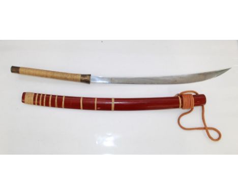 Circa 19th century ceremonial Burmese Dha, complete with original wooden scabbard and orange rope tassel. Measurement etching
