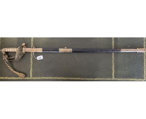 British ER II naval officers sword, 31.5" blade with etched detail, complete with scabbard and dress knot 