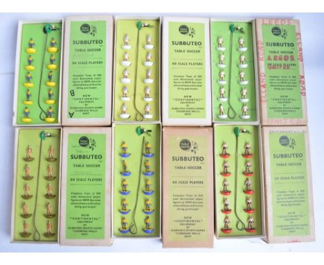 Thirty four boxed vintage Subbuteo table football teams, most sets complete 
