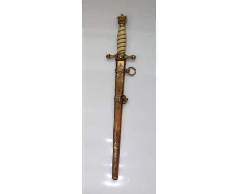 WWII German Navy Kriegsmarine dress dagger. This example has the bolt of lightning design to scabbard. Ornate etching to blad