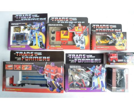 Seven boxed Transformer models from Hasbro to include vintage Optimus Prime (item no E 5796, box unopened/factory sealed, box