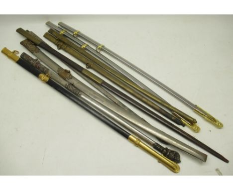 Selection of nine scabbards of various styles and eras, including a naval officer sword scabbard, a masonic templar sword sca