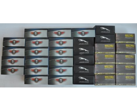 Thirty three boxes diecast model vehicles from Atlas editions to include classic buses, Jaguar series and British Touring Car