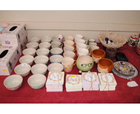 A quantity of Langs pottery tea ware; various Langs tile letters etc.