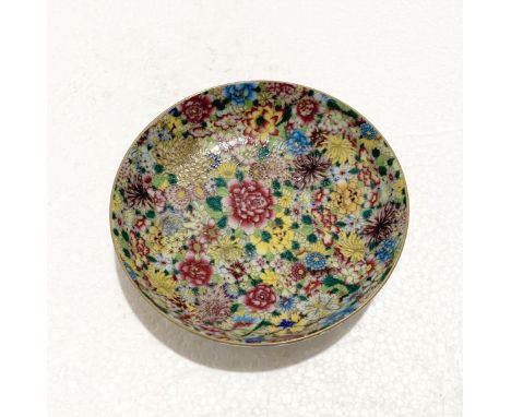 A Chinese Famille Rose Saucer Dish, Qianlong Mark, Republic Period, D. 11.4 cm Provenance: Estate of the Lam's family from Ho