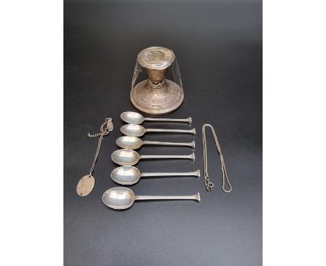 A set of six silver coffee spoons, by&nbsp;William Henry Leather, Birmingham 1917, 57g; together with a squat silver candlest