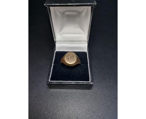 A 9ct gold and blue enamel masonic swivel signet ring, engraved initials 'R.F.D', gross weight 5.9g. 