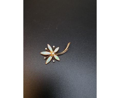 A yellow metal opal and diamond floral brooch,&nbsp;41mm. 