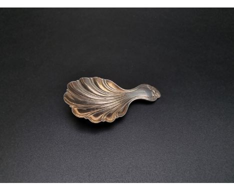 A Victorian silver shell caddy spoon, by Yapp&nbsp;&amp; Woodward, Birmingham 1846, 16.4g. 