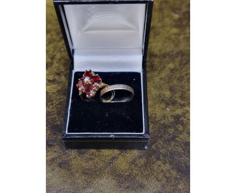 A 9ct gold pearl and garnet ring, size K 1/2, gross weight 3.7g; together with a 14ct white gold wedding band, size M, 2g. 