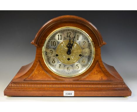 A 20th century Franz Hermle mahogany cased Westminster chiming mantel clock, silver dial, stylised Arabic numerals, 29cm high