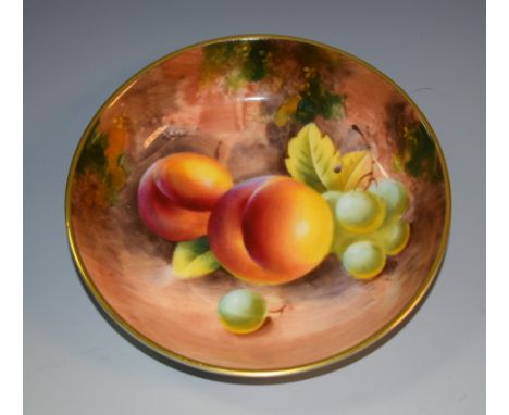 A Royal Worcester pin dish,  signed, with ripe fruit on a mossy ground, 11cm diam, printed crown and circle mark in black  Co