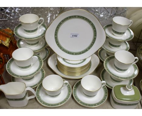 A Royal Doulton Rondelay pattern tea set, comprising twelve teacups, saucers and side plates, milk and sugar, pair of cake pl