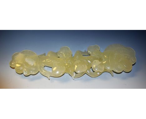 A Chinese celadon jade lotus carving, 36cm long