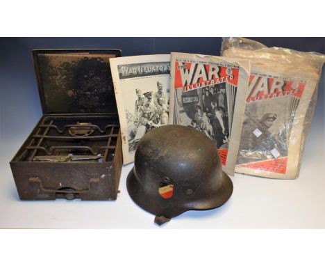 Militaria - a Nazi Germany helmet, leather liner; an Issue stove, pullout action, tin case; a quantity of War Illustrated mag