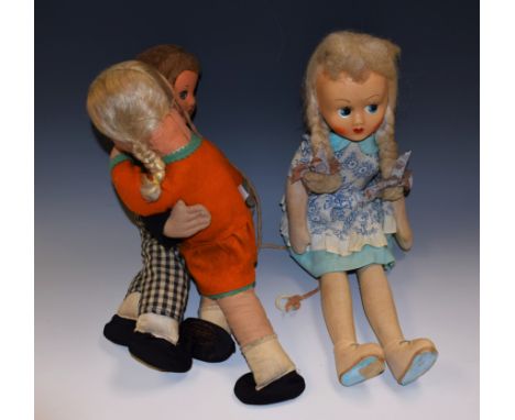 Dolls - a pair of Dean Rag Book Co Hygenic Toys Dancing Dolls, in printed and coloured cloth, she is wearing a orange felt dr