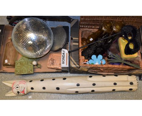 Interior Design - a wicker hamper; a glitterball; a novelty carved wood floor standing cat model; glass bottles; a Schweppes 