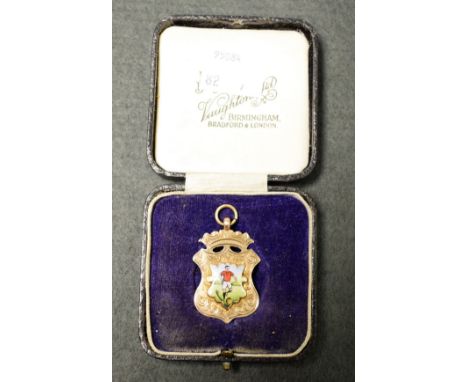 A hallmarked 9ct gold and enamel football fob, Pilsley League Winners 1920-1, J Hippey