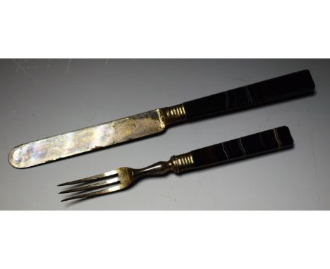 A 19th century band agate knife and fork set, black brown tapering handles, different tone wavy bands, silver plated blade an