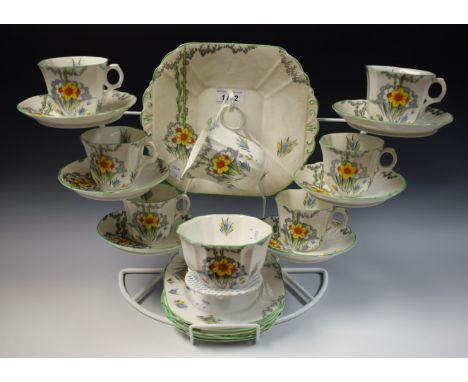 A Melba Staffordshire china teaset for six, printed and painted with Daffodils and Crocus
