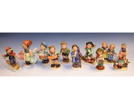 Goebel ceramic figures including Strolling Along, Happy Days, Accordion Boy, Skier Boy, etc (11)
