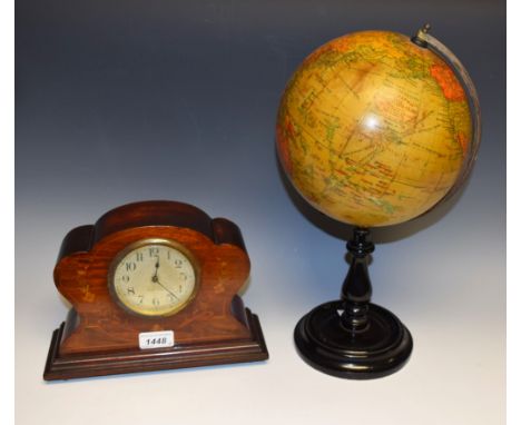 A 1920s/30s 8 inch Geographia Terrestrial globe, ebonised stand;  a Art Nouveau inlaid mahogany shaped balloon clock (2)