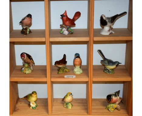 Beswick ceramic bird models including Chaffinch, Bullfinch, Goldfinch, Greenfinch, Wren, etc; others, Royal Worcester Red Car